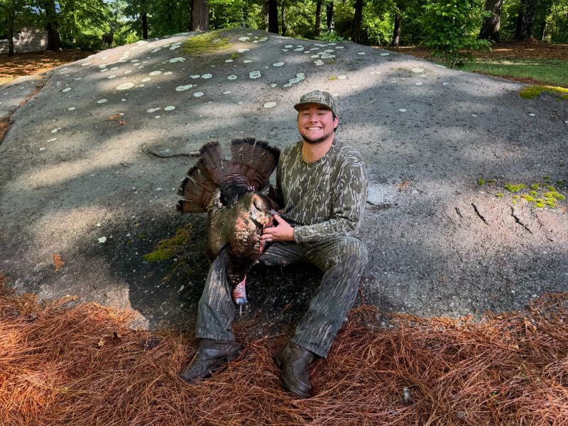 Forestry student with turkey